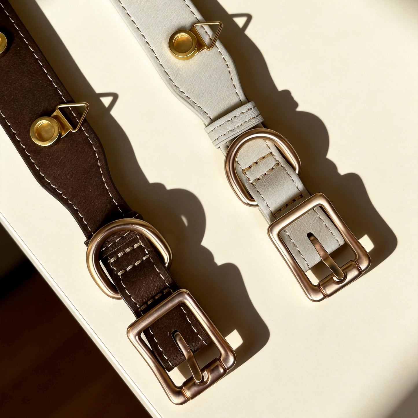 Back view of white leather-style cat collar with gold-tone adjustable buckle and soft inner lining | DIYJade