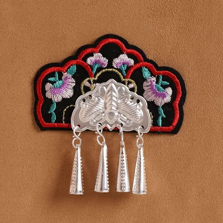Red edged embroidery patch, vibrant flower motif with short silver tassel drops