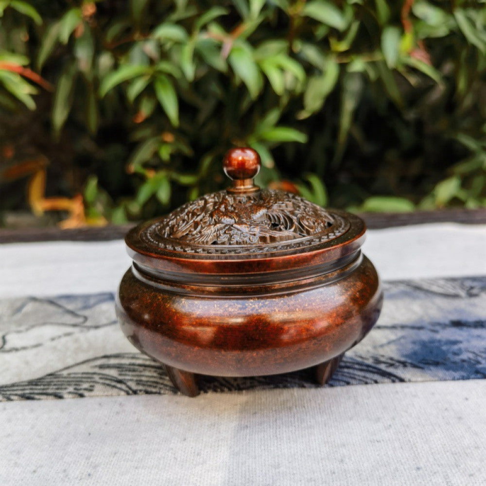 Reddish-brown incense burner with carved lid, clear front view on blue cloth | DIY Jade