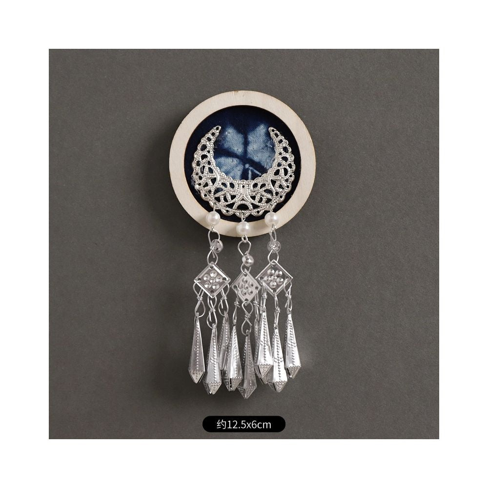 Round ethnic silver brooch with double tassels