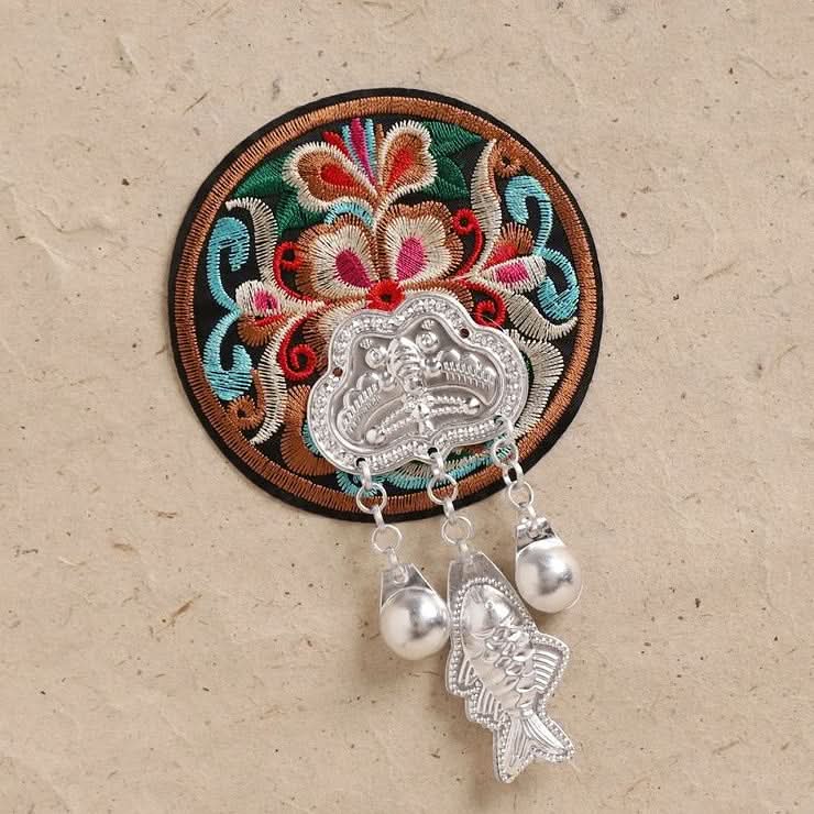 Round embroidered tassel wall hanging