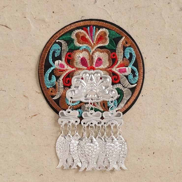 Round floral embroidered tassel decor