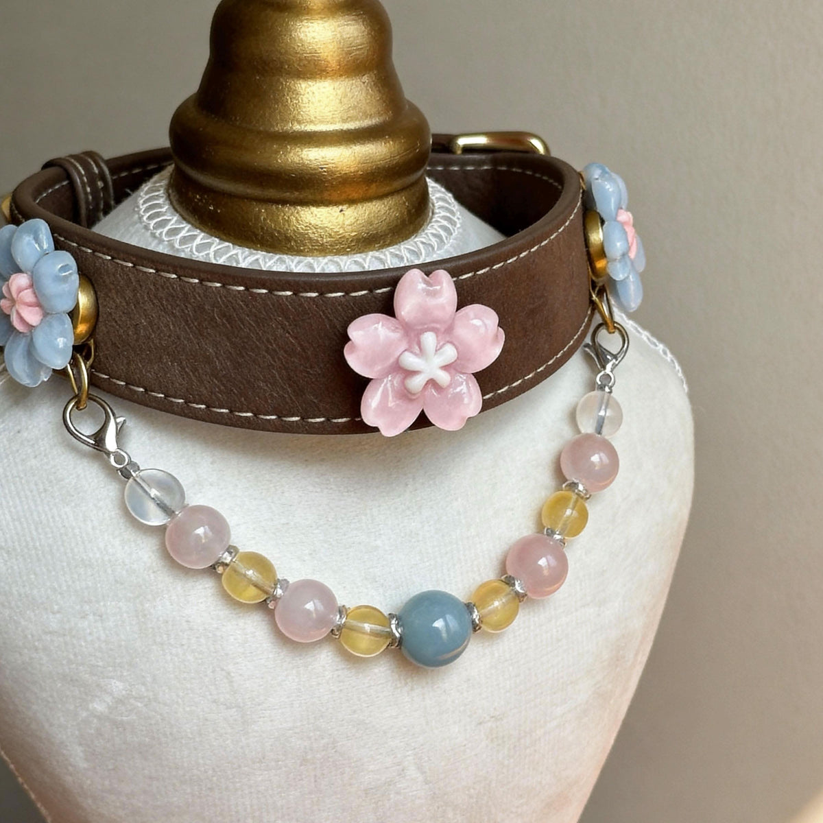 Mannequin bust showing brown pet collar decorated with cherry blossom jade beads | DIY Jade