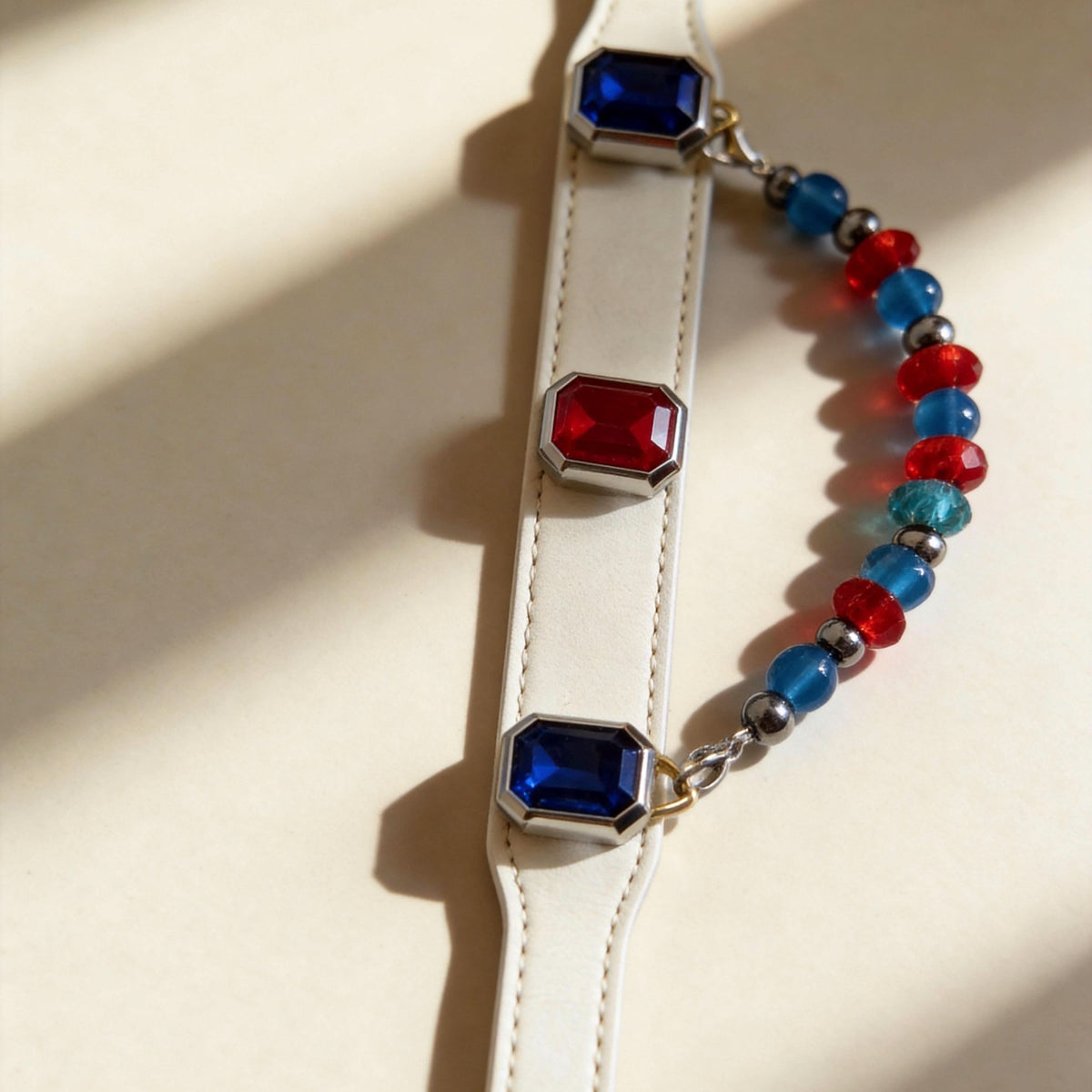 Side view off-white leather pet collar with red and blue gems and colourful jade beads | DIY Jade