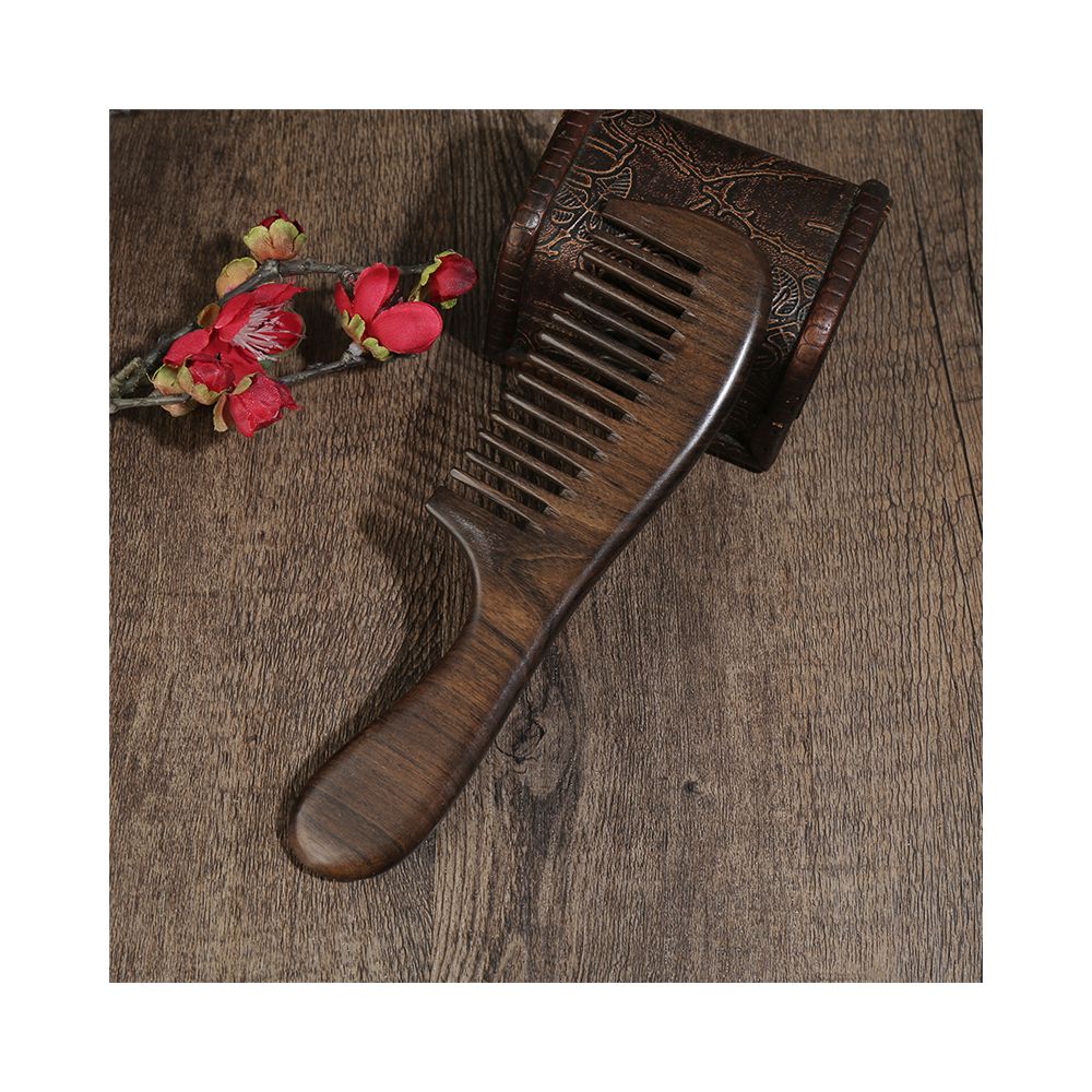 Side view of natural ebony wood hair comb