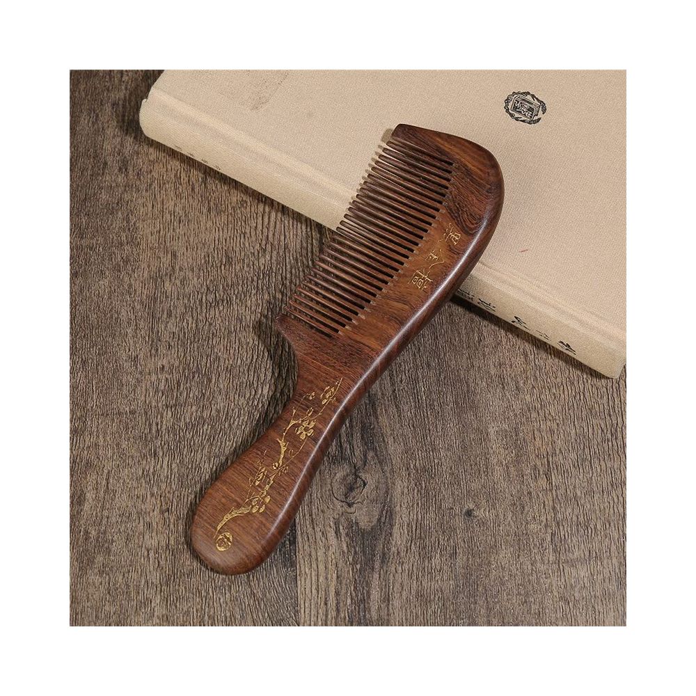 Side view of natural ebony wood hair comb