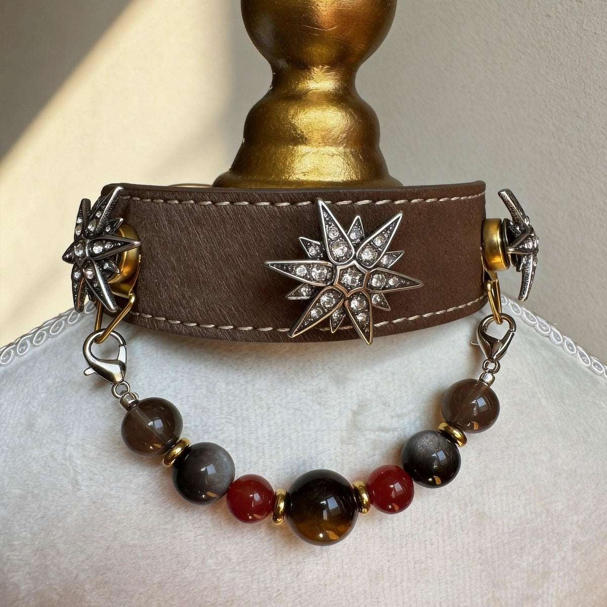 Mannequin bust showing brown leather pet collar with star rhinestone decor and earth tone jade beads | DIY Jade