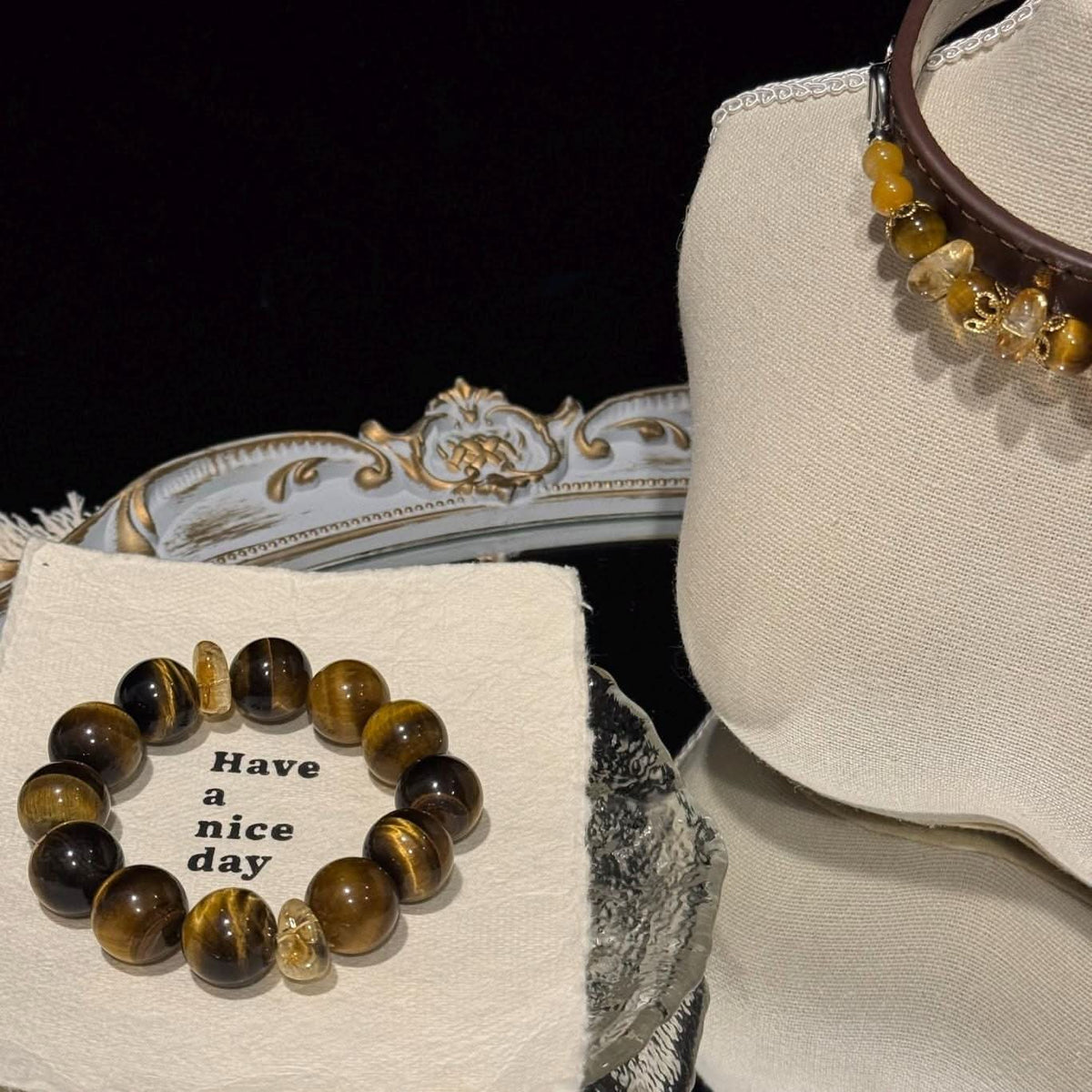 Tiger‑eye stone human bracelet paired with pet collar on vintage decorative tray | DIY Jade