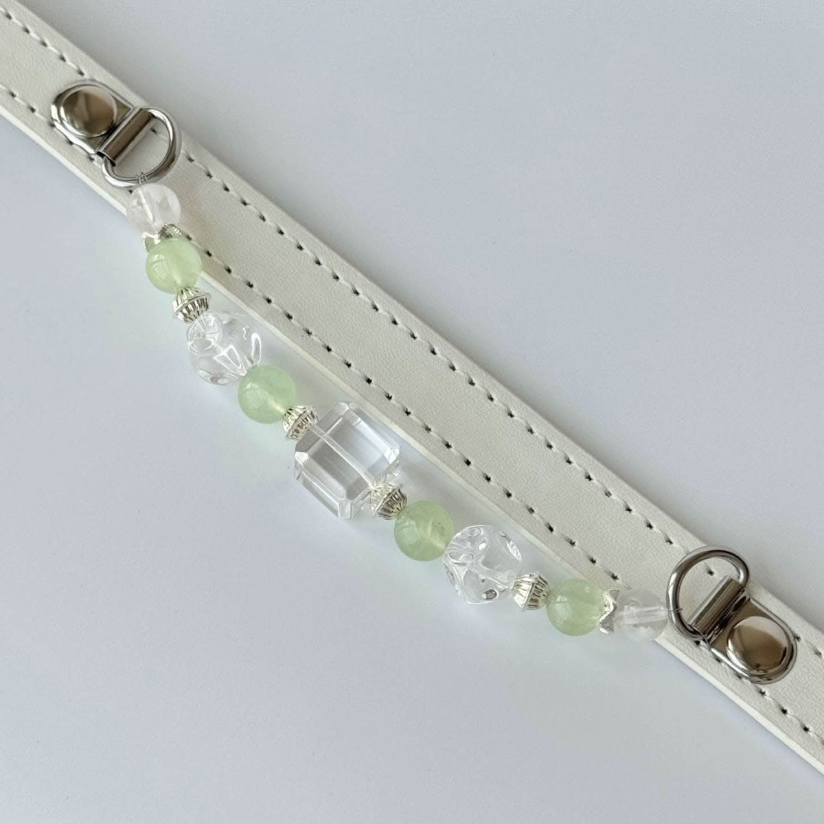 Top view white leather collar strap with dangling pale green crystal bead accessory | DIY Jade