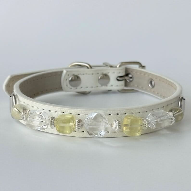 Product display of white pet collar with pale yellow-green crystal bead detailing | DIY Jade
