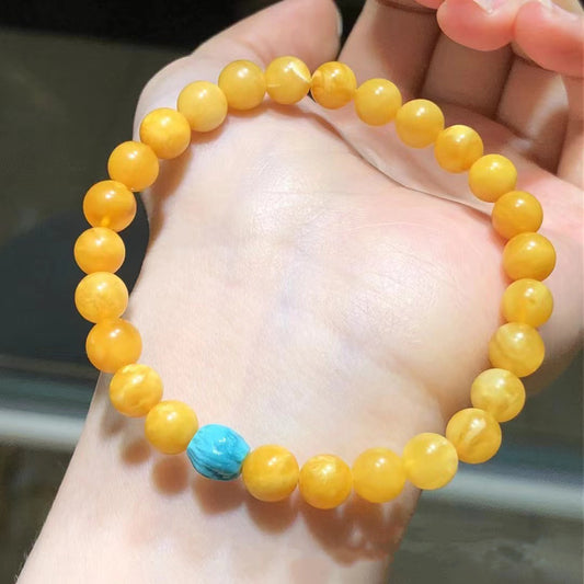 Yellow amber round bead bracelet with single turquoise accent | DIY Jade